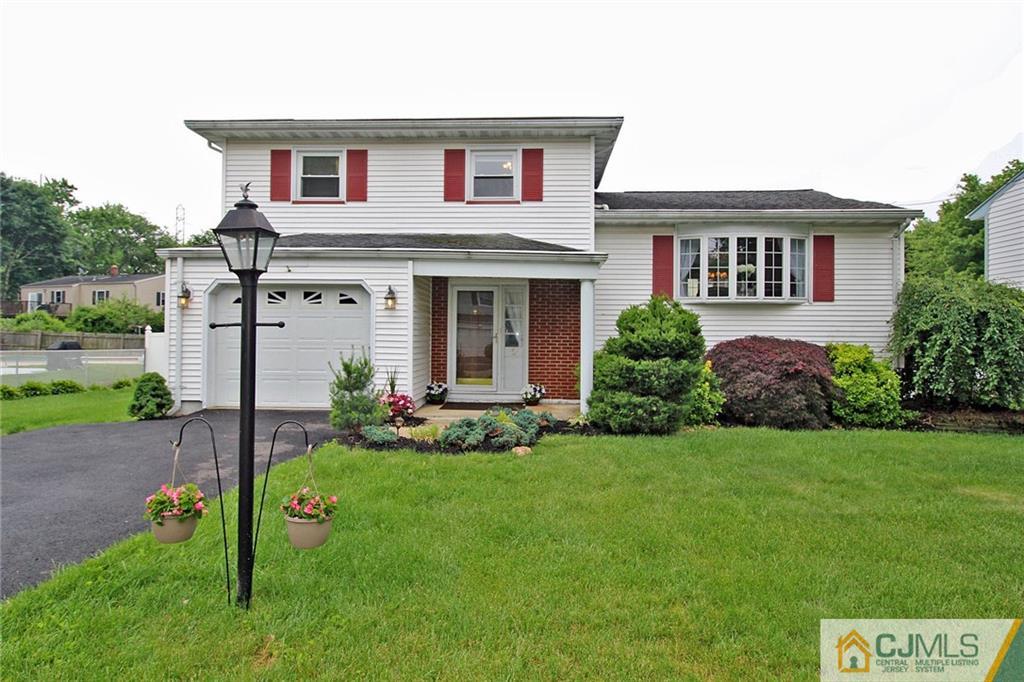 a view of a yard in front of a house