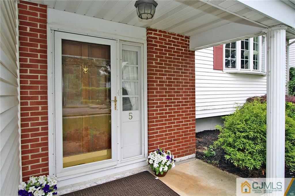5 Delmar Place Edison, NJ 08837 - Photo 3 of 25 a view of a door front of a house