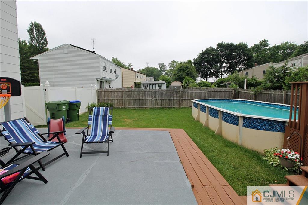 5 Delmar Place Edison, NJ 08837 - Photo 24 of 25 a view of a chairs and table back yard of the house
