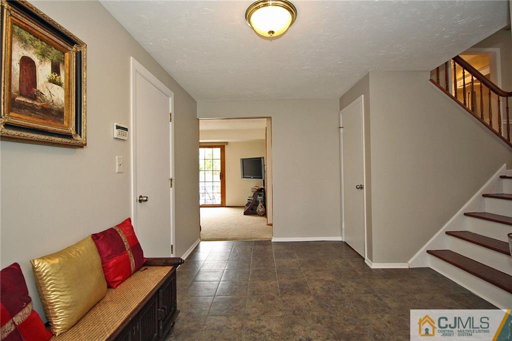 5 Delmar Place Edison, NJ 08837 - Photo 4 of 25 a view of living room and workspace