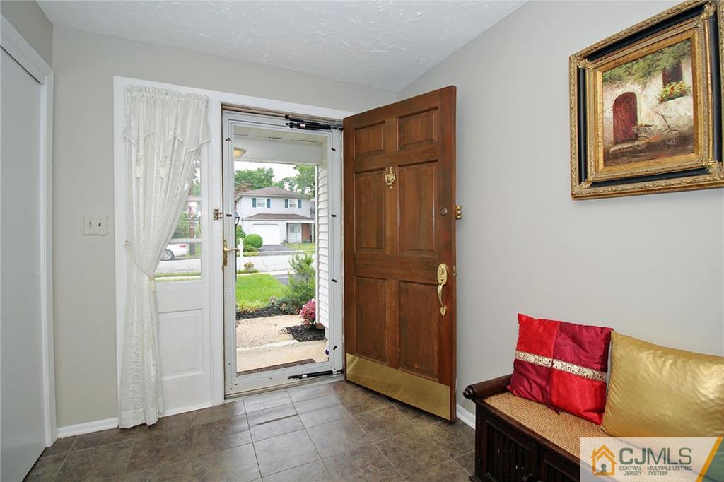 5 Delmar Place Edison, NJ 08837 - Photo 5 of 25 a living room with furniture
