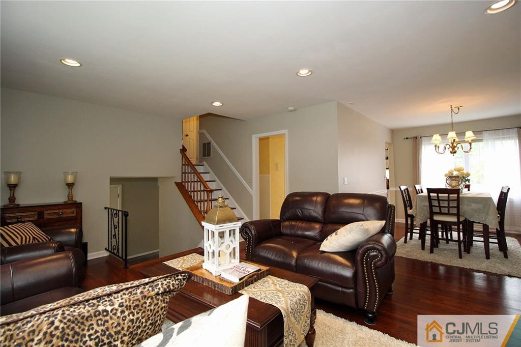 5 Delmar Place Edison, NJ 08837 - Photo 8 of 25 a living room with furniture and wooden floor