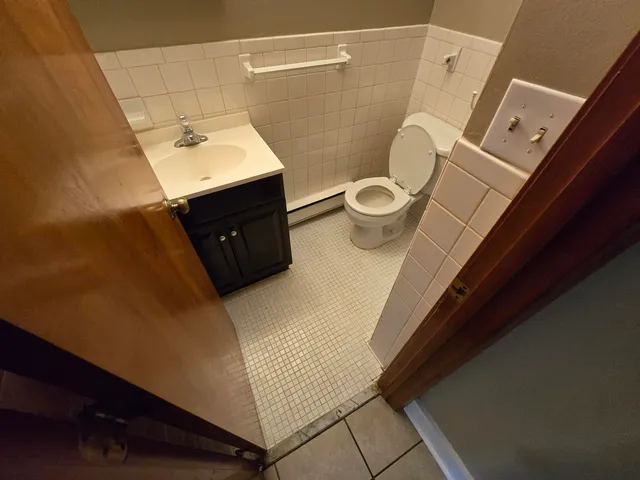 a bathroom with a sink and toilet