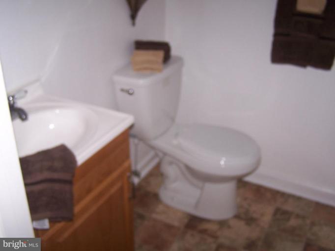 5229 Cedgate Road Baltimore, MD 21206 - Photo 8 of 12 Half bath off clubroom
