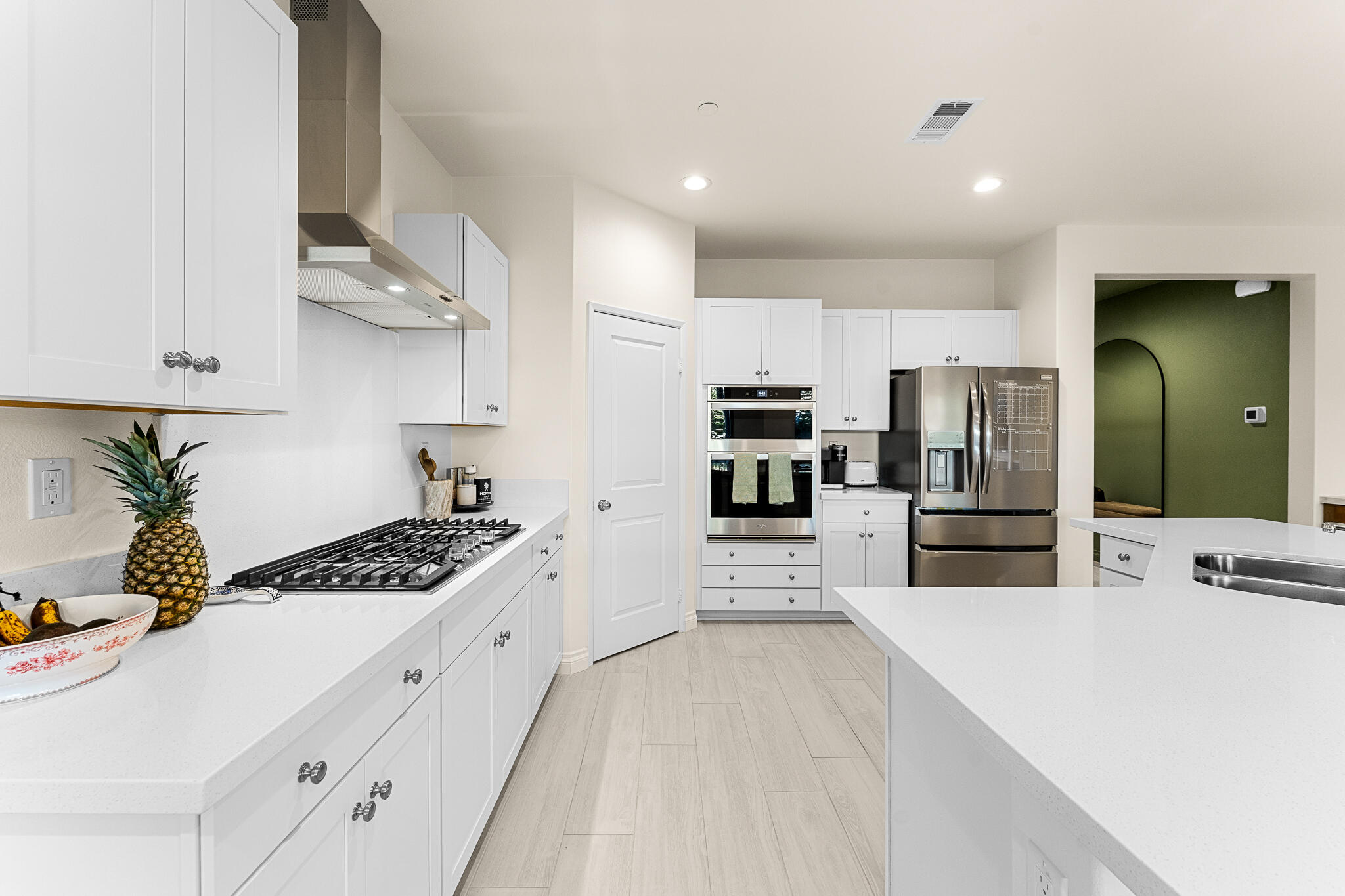 84458 Calle Larriva Coachella, CA 92236 - Photo 18 of 43 a kitchen with stainless steel appliances a refrigerator sink and stove