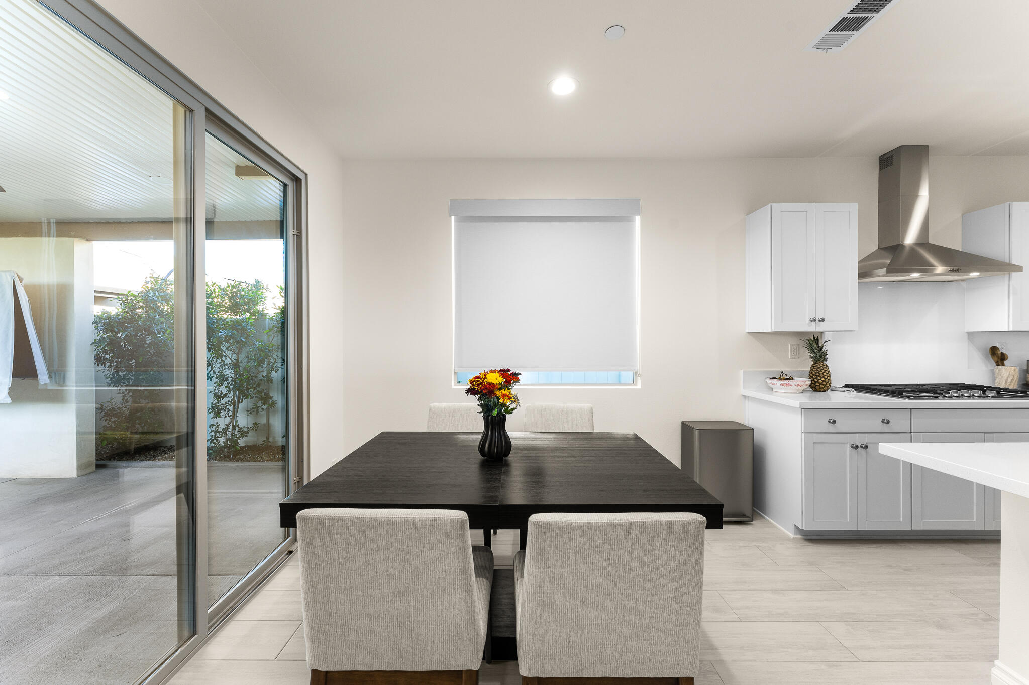 84458 Calle Larriva Coachella, CA 92236 - Photo 19 of 43 a kitchen with stainless steel appliances granite countertop a sink a stove and a refrigerator