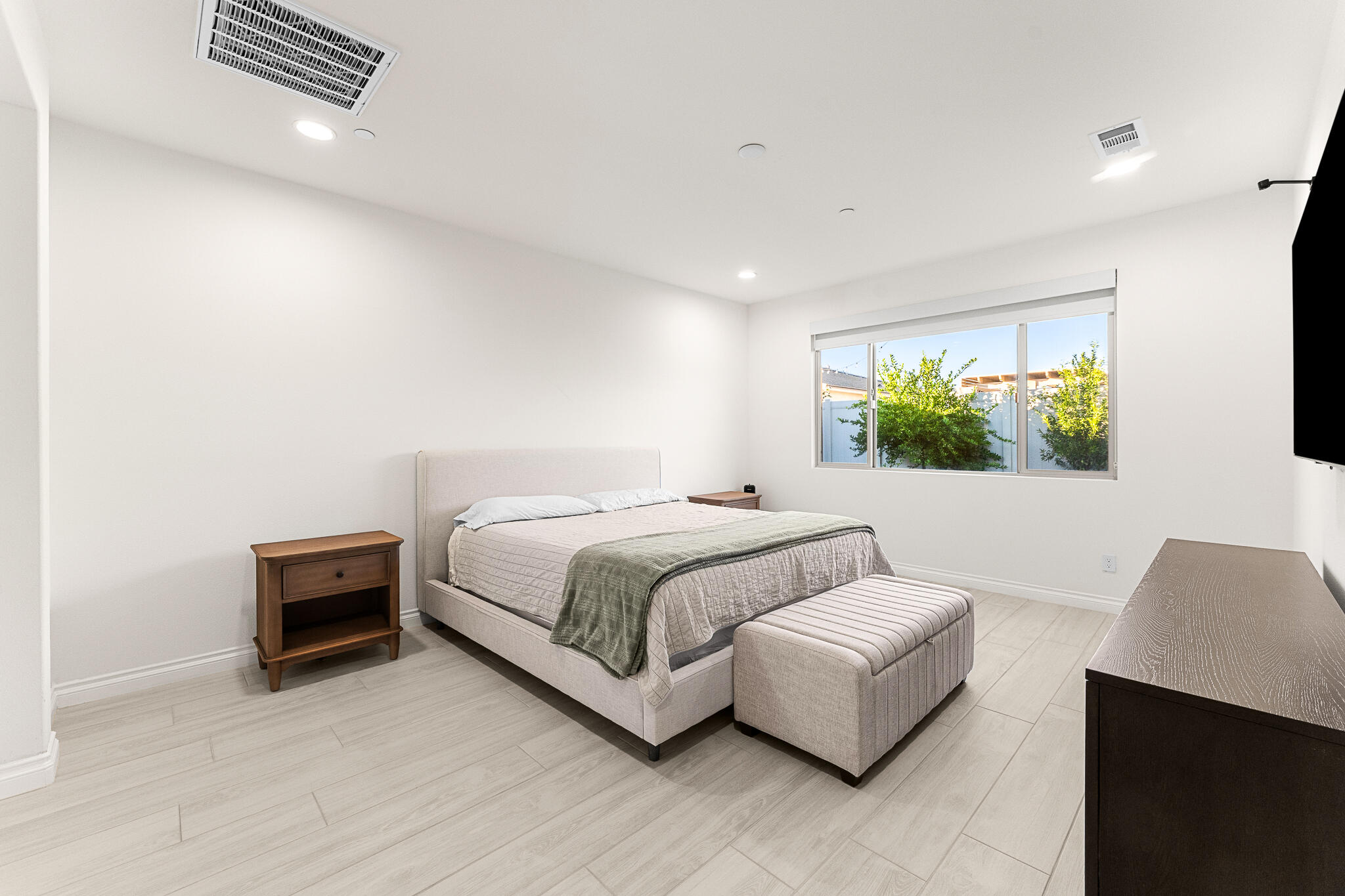 84458 Calle Larriva Coachella, CA 92236 - Photo 22 of 43 a bedroom with a bed and a couch