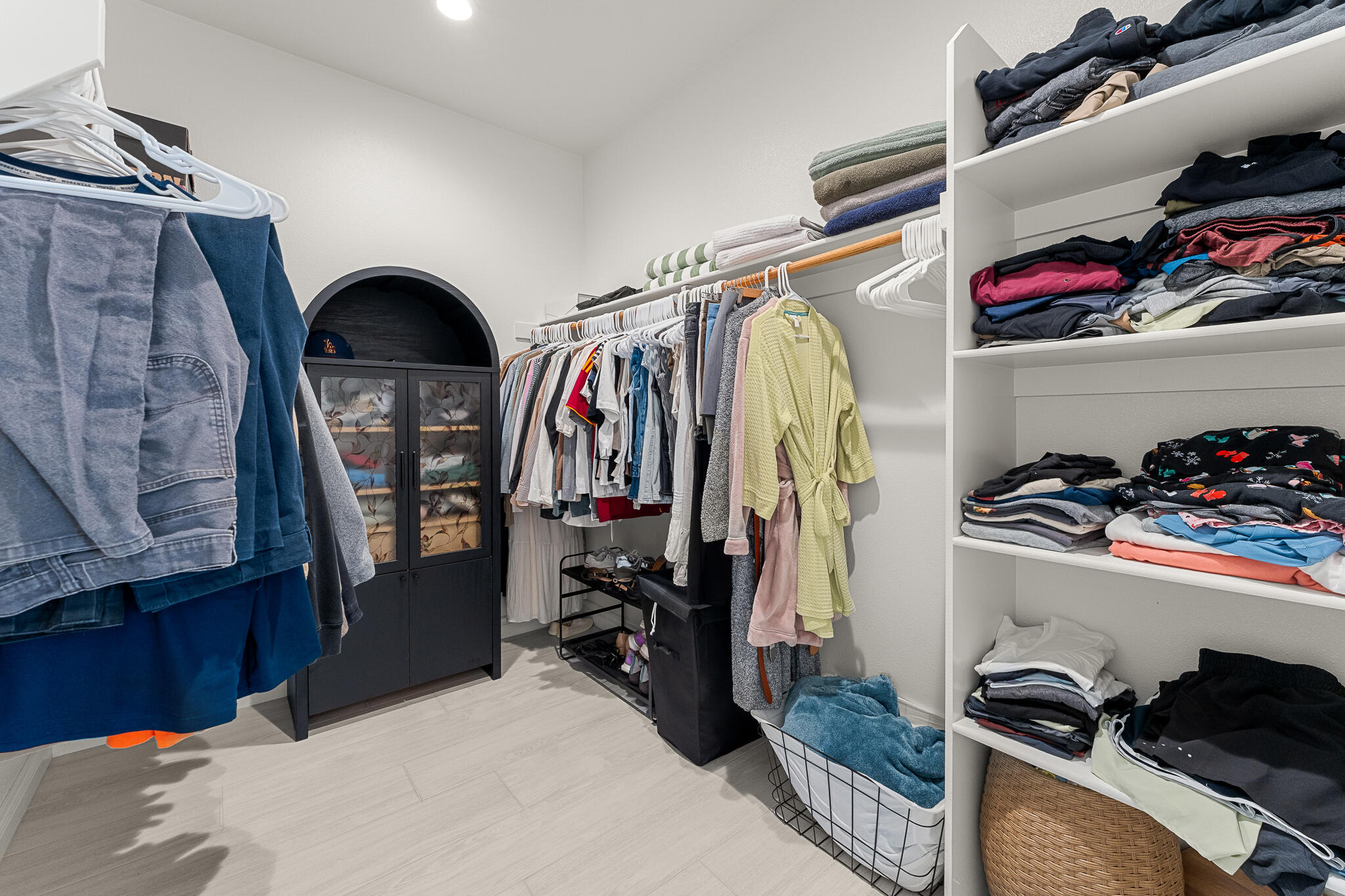 84458 Calle Larriva Coachella, CA 92236 - Photo 23 of 43 a view of walk in closet with clothes and shoes