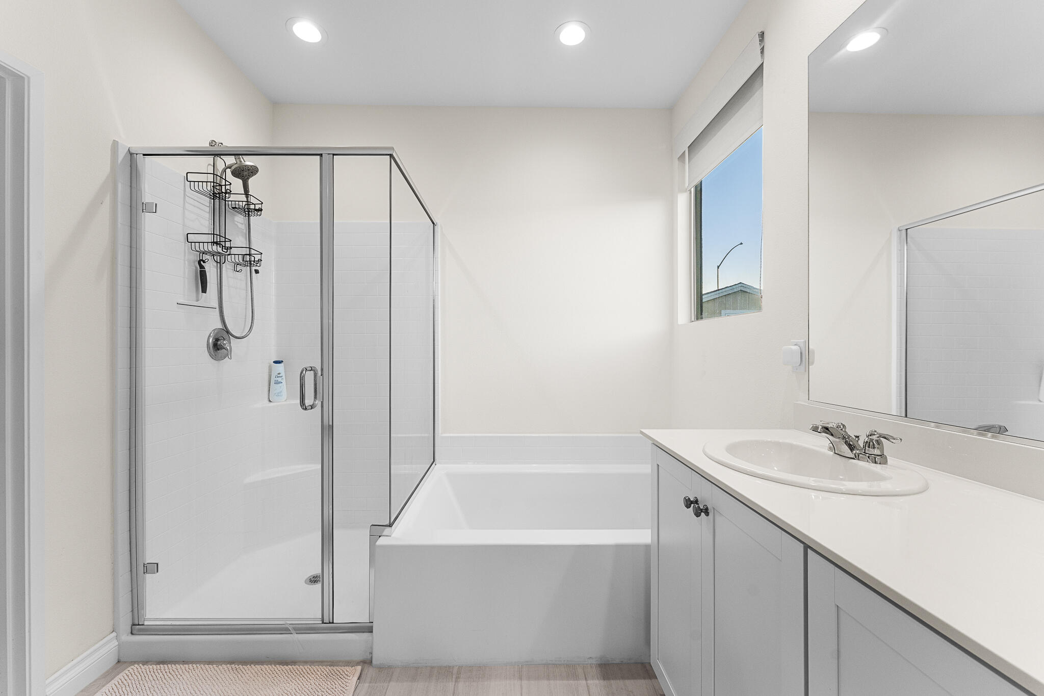 84458 Calle Larriva Coachella, CA 92236 - Photo 24 of 43 a bathroom with a shower sink and mirror