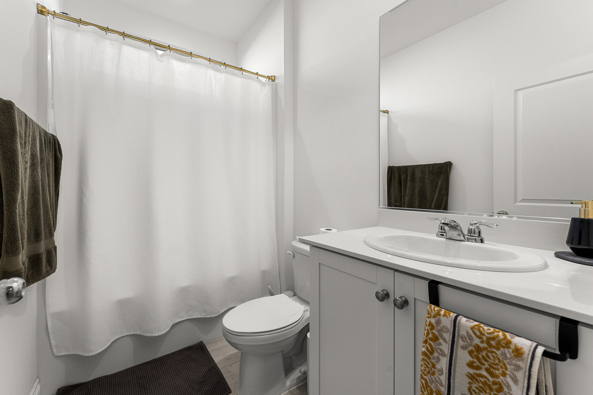 84458 Calle Larriva Coachella, CA 92236 - Photo 29 of 43 a bathroom with a sink and a mirror