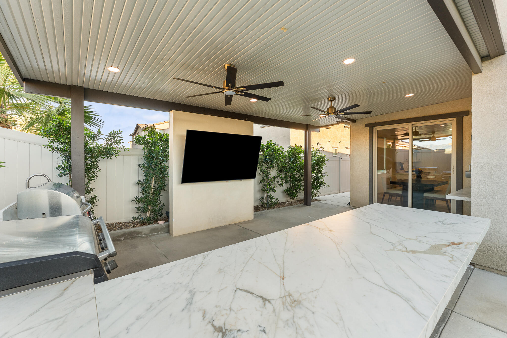 84458 Calle Larriva Coachella, CA 92236 - Photo 33 of 43 a view of a livingroom with furniture and flat screen tv