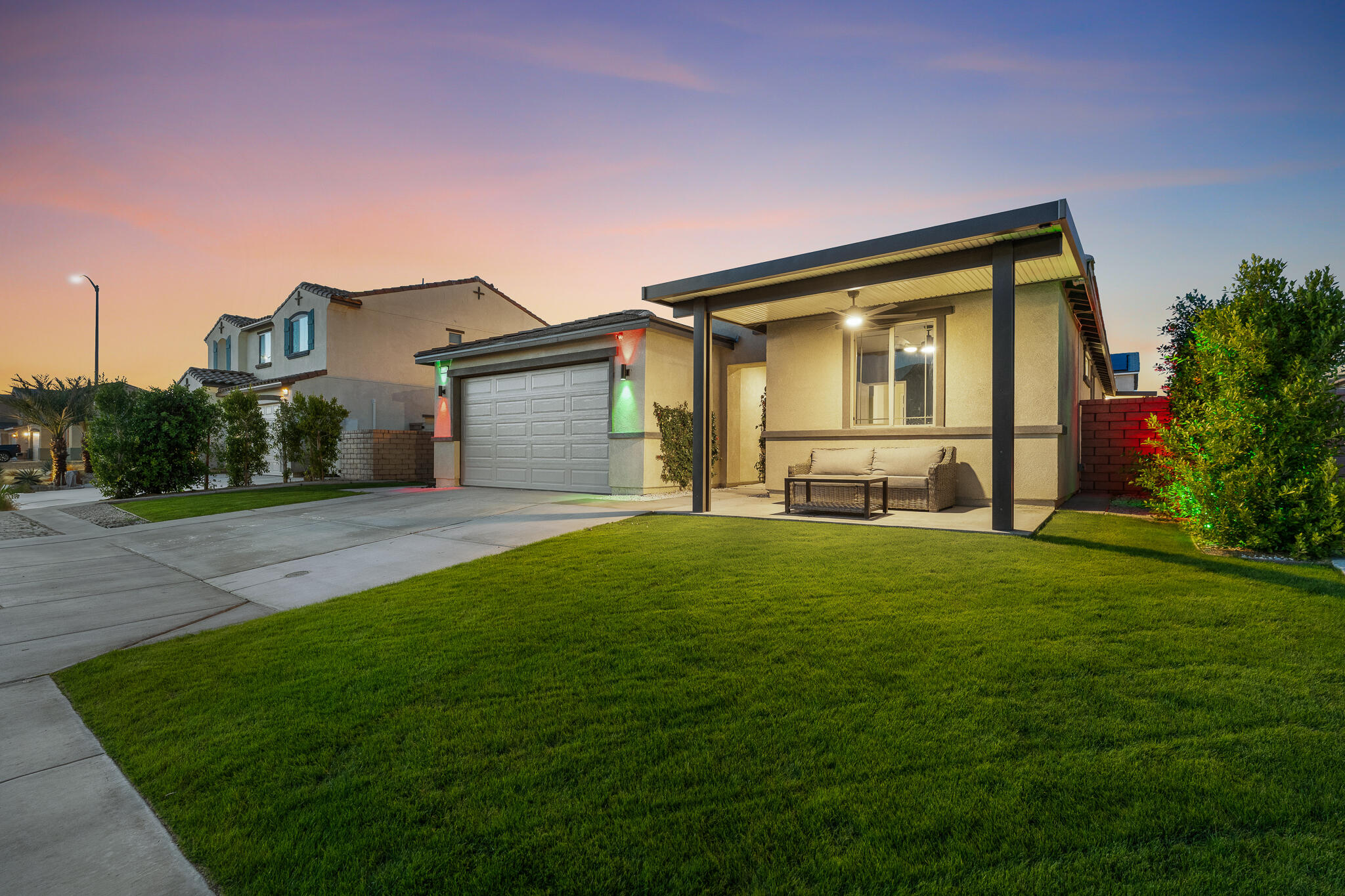84458 Calle Larriva Coachella, CA 92236 - Photo 38 of 43 a front view of a house with a yard