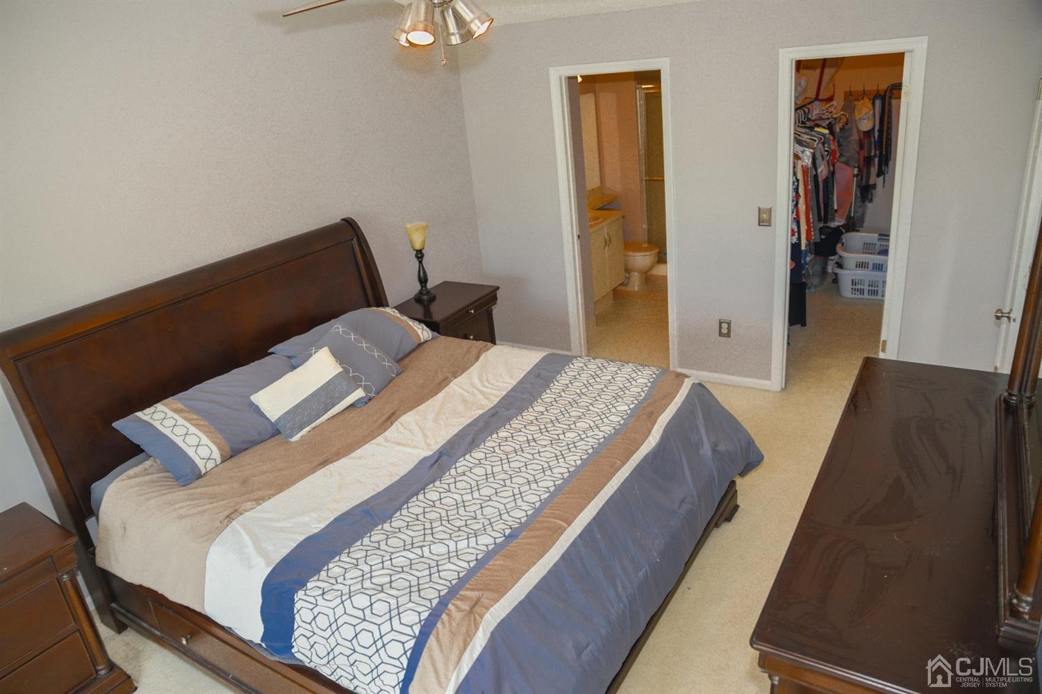 4206 Riddle Court Bridgewater, NJ 08807 - Photo 18 of 25 a bedroom with a bed and wooden floor