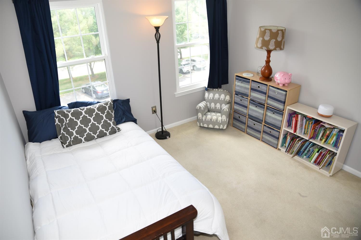 4206 Riddle Court Bridgewater, NJ 08807 - Photo 21 of 25 a bedroom with furniture and a window
