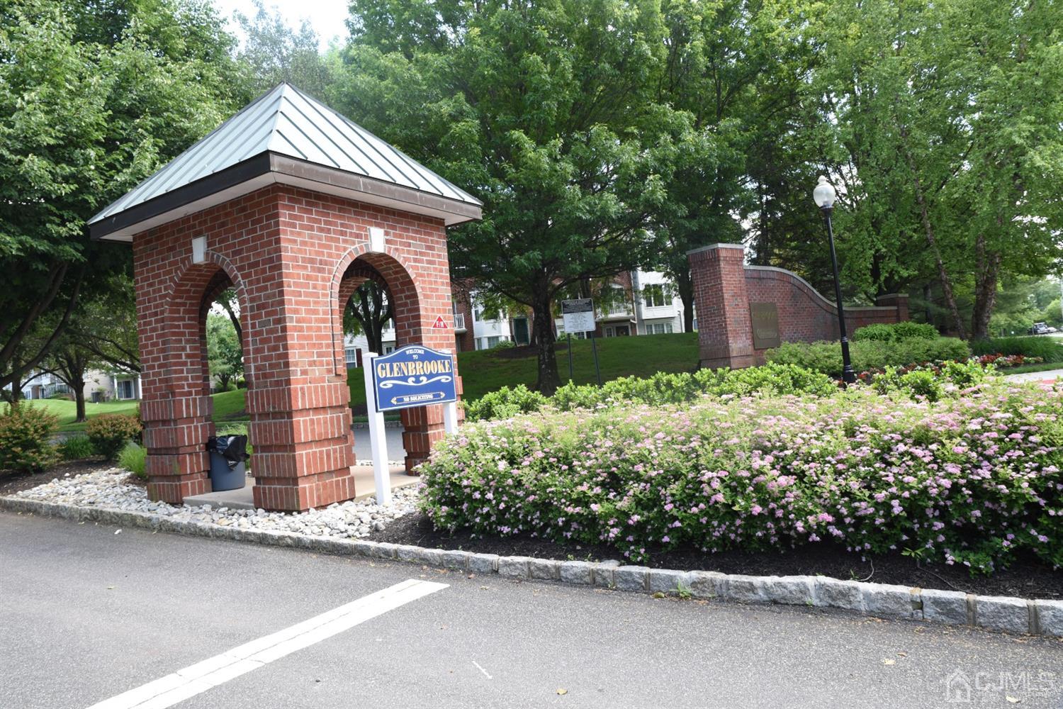 4206 Riddle Court Bridgewater, NJ 08807 - Photo 23 of 25 a front view of a house with a garden