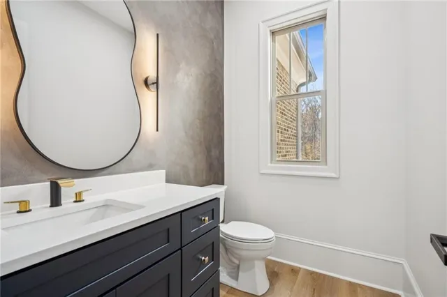 a bathroom with a tub shower and sink