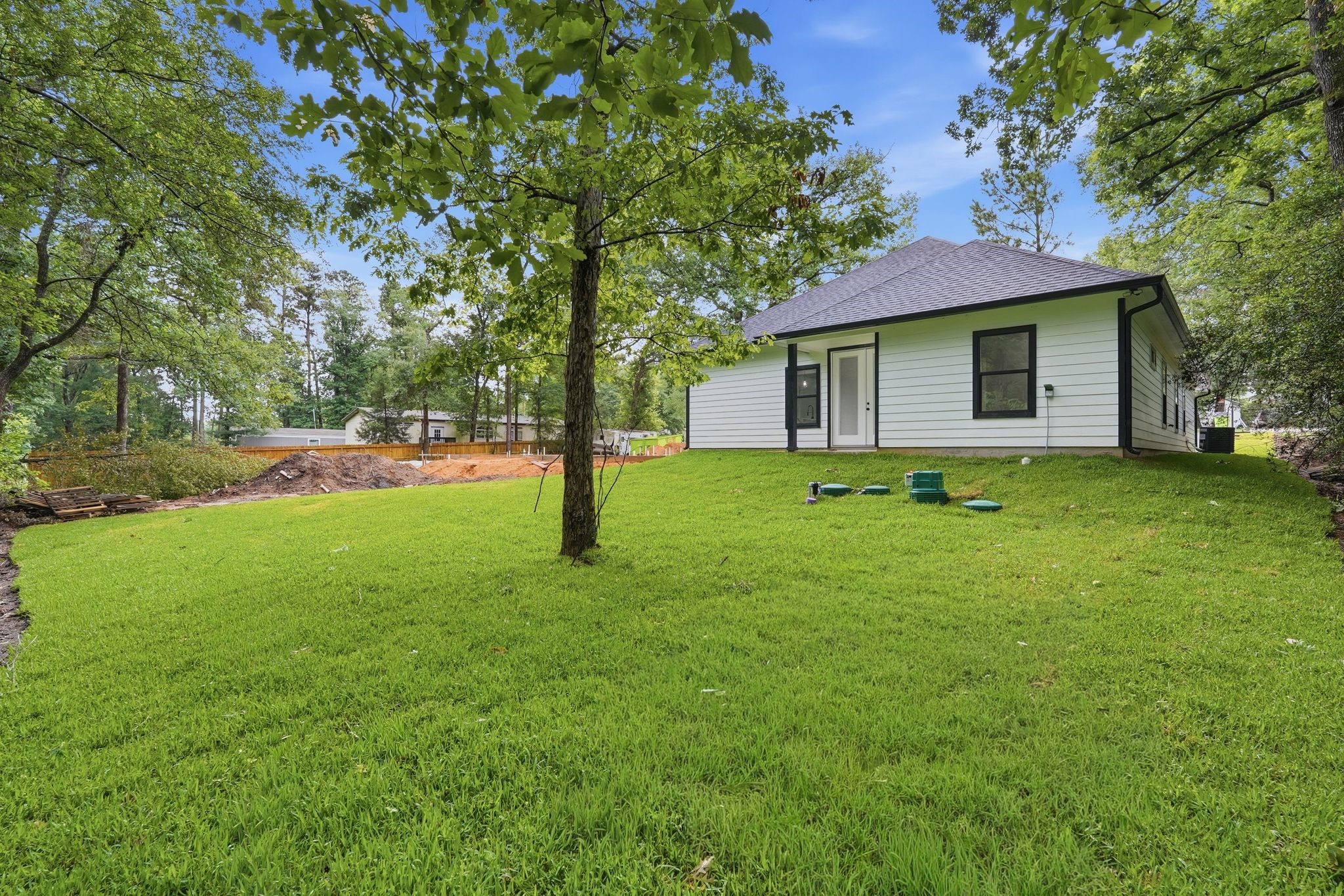 3575 Roy Bean Road Willis, TX 77378 - Photo 33 of 40 a view of a house with a yard
