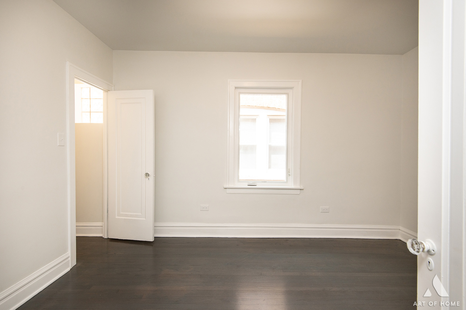 1820 Gunderson Avenue, Unit 3 Berwyn, IL 60402 - Photo 6 of 17 an empty room with wooden floor and windows