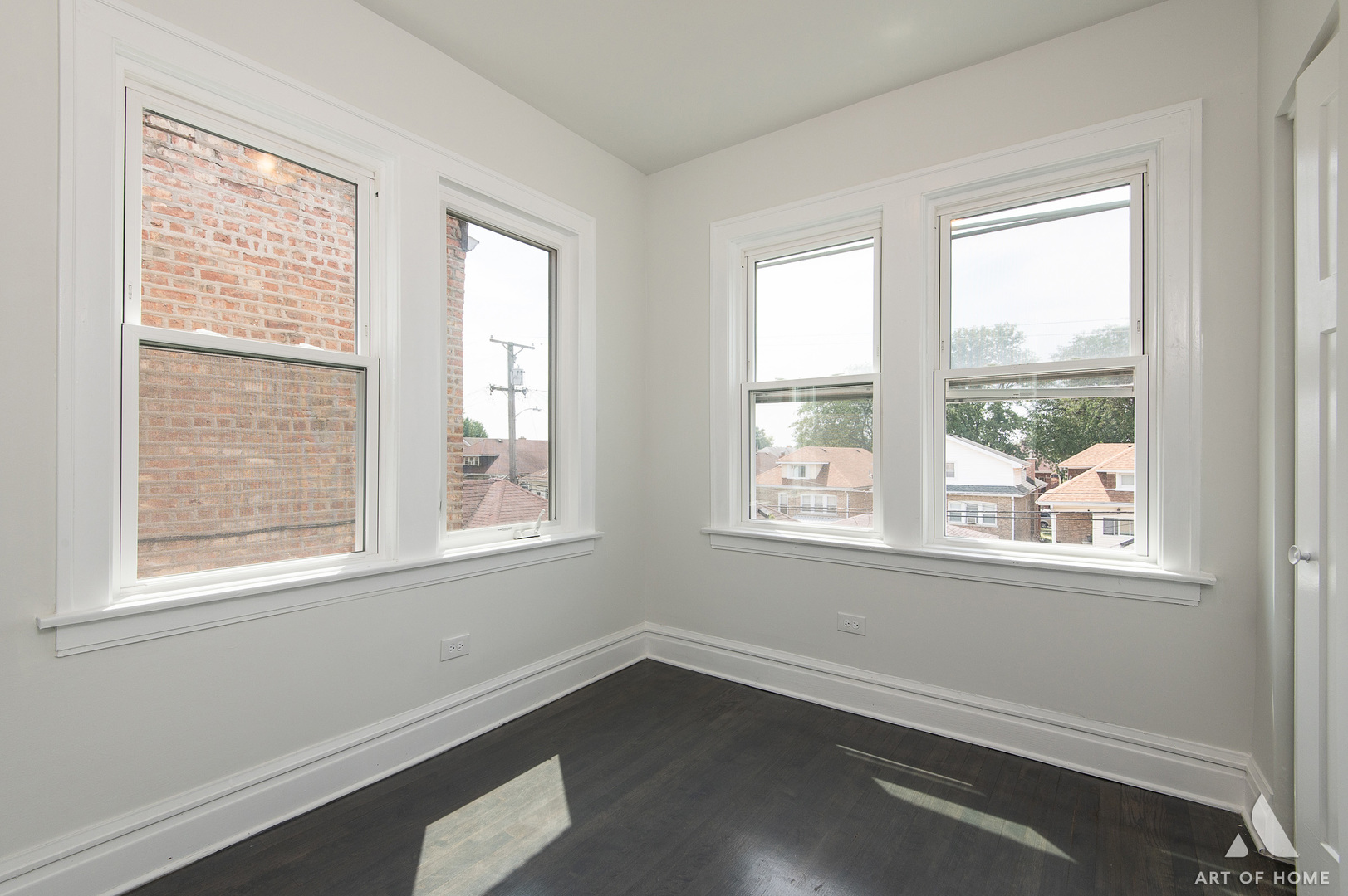 1820 Gunderson Avenue, Unit 3 Berwyn, IL 60402 - Photo 8 of 17 a view of an empty room with wooden floor and a window