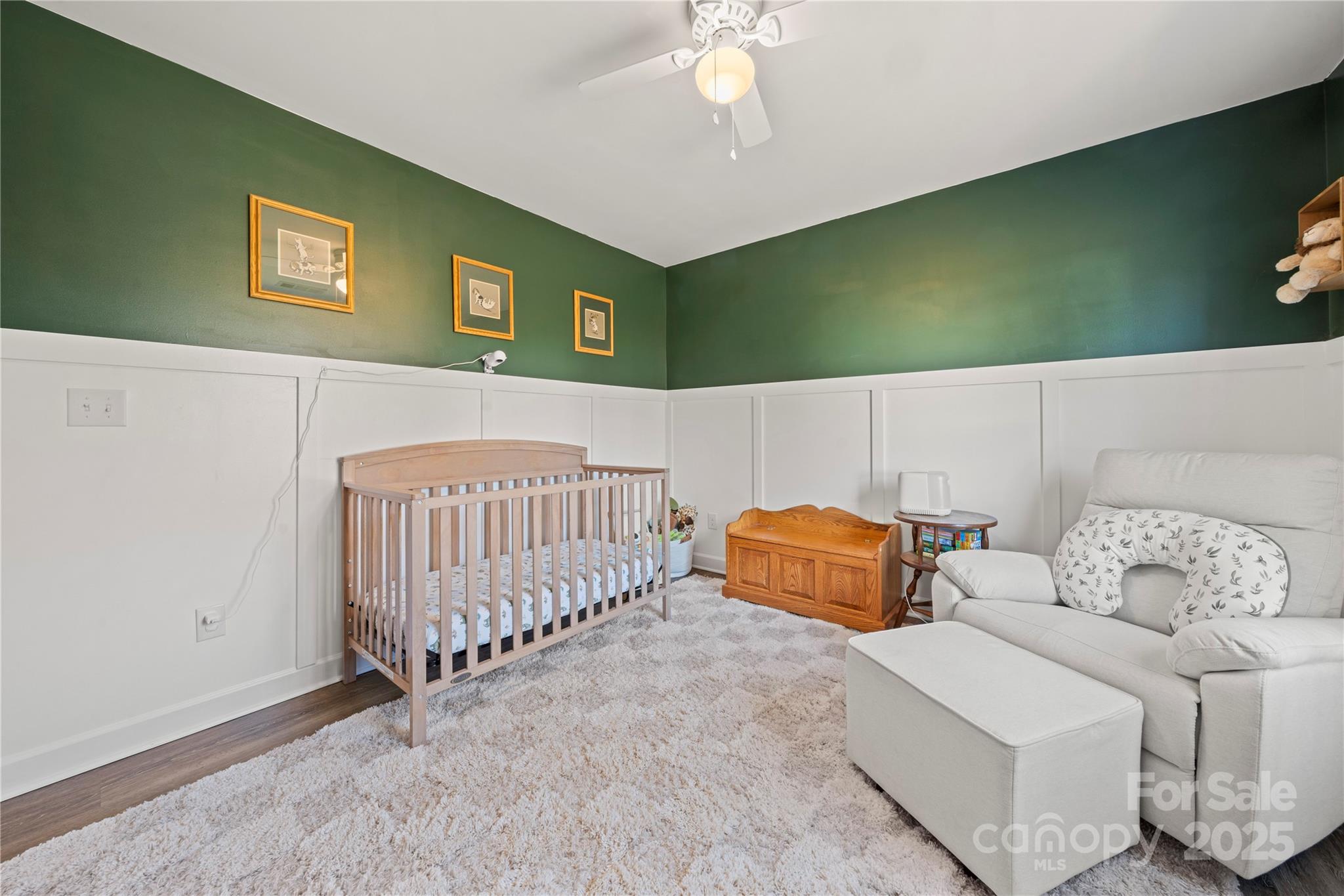 131 Lowry Row, Unit 8 York, SC 29745 - Photo 22 of 32 a bedroom with furniture and a lamp