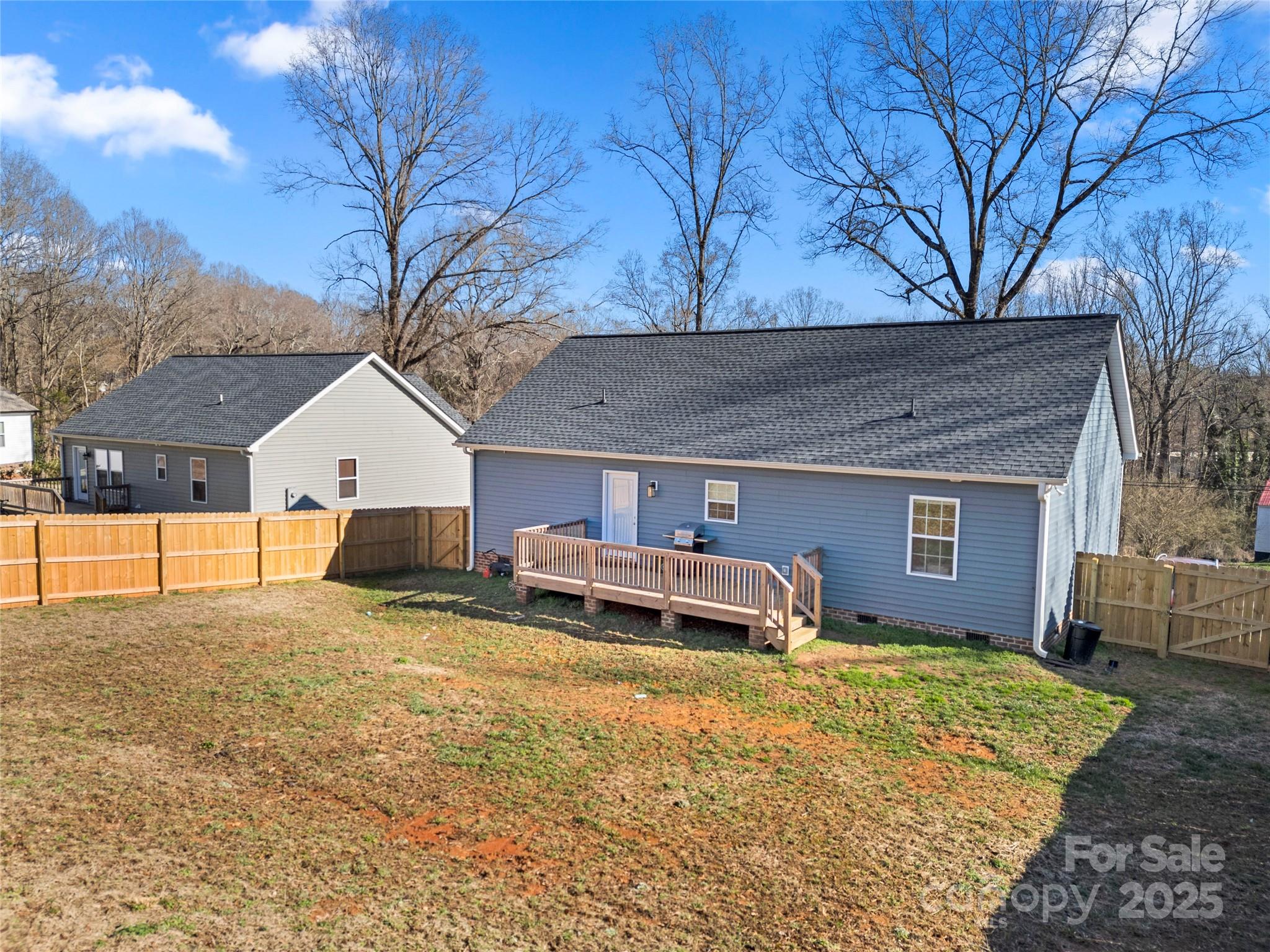 131 Lowry Row, Unit 8 York, SC 29745 - Photo 32 of 32 a view of a house with a yard and sitting area