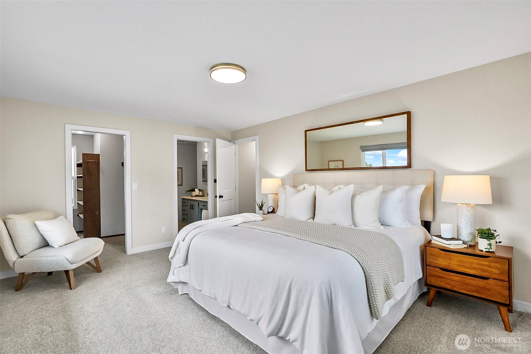 18215 3rd Place Southwest Normandy Park, WA 98166 - Photo 17 of 35 a bedroom with a bed and a couch
