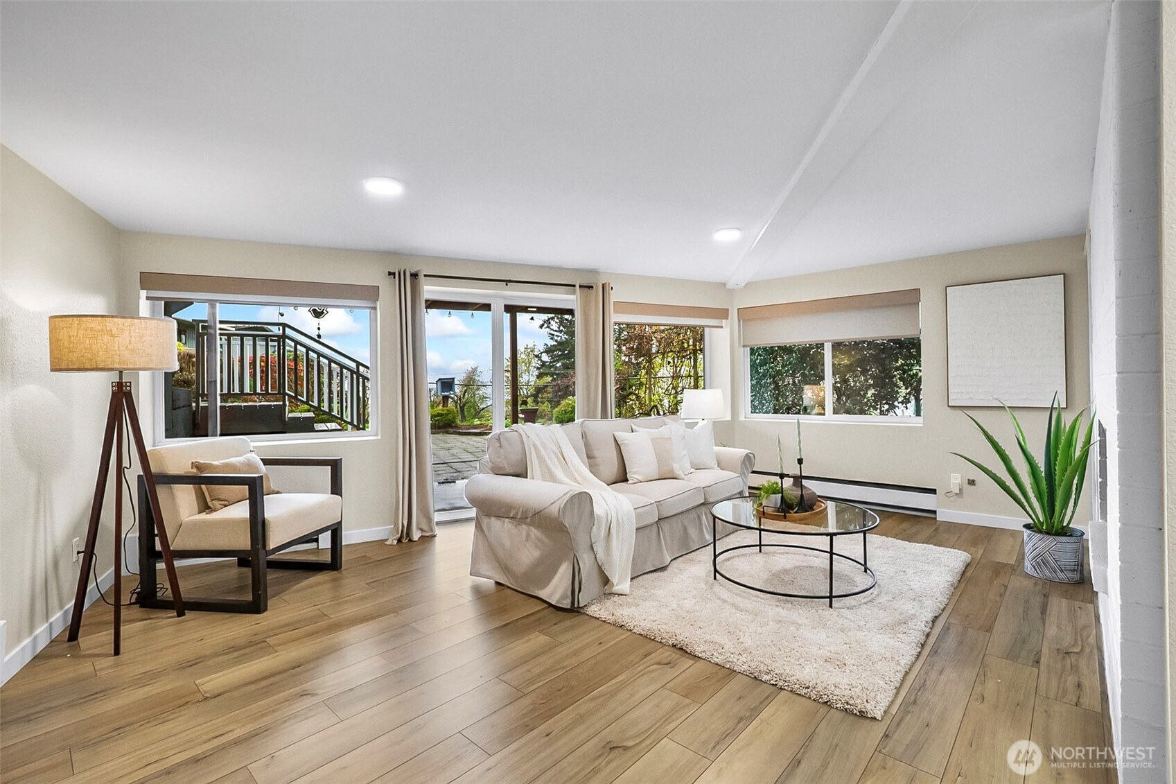 18215 3rd Place Southwest Normandy Park, WA 98166 - Photo 22 of 35 a living room with furniture and a large window