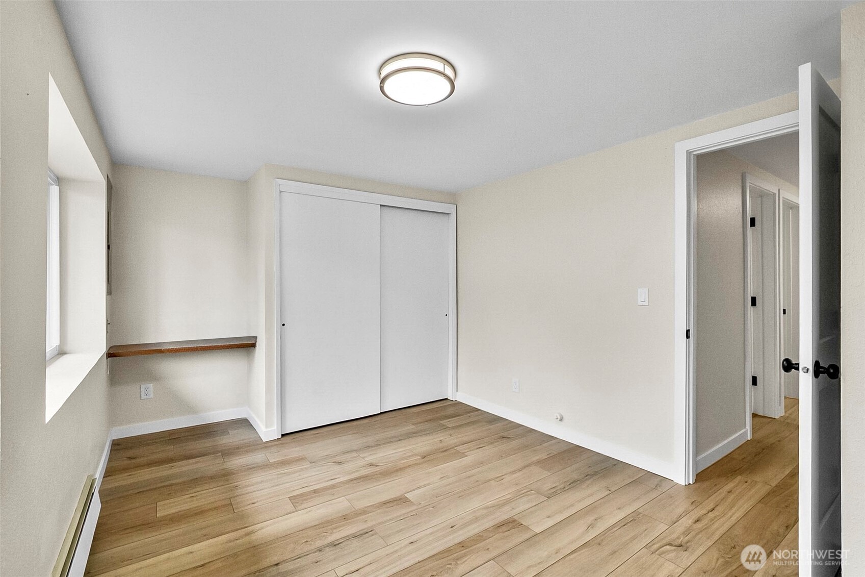 18215 3rd Place Southwest Normandy Park, WA 98166 - Photo 31 of 35 a view of a room with wooden floor