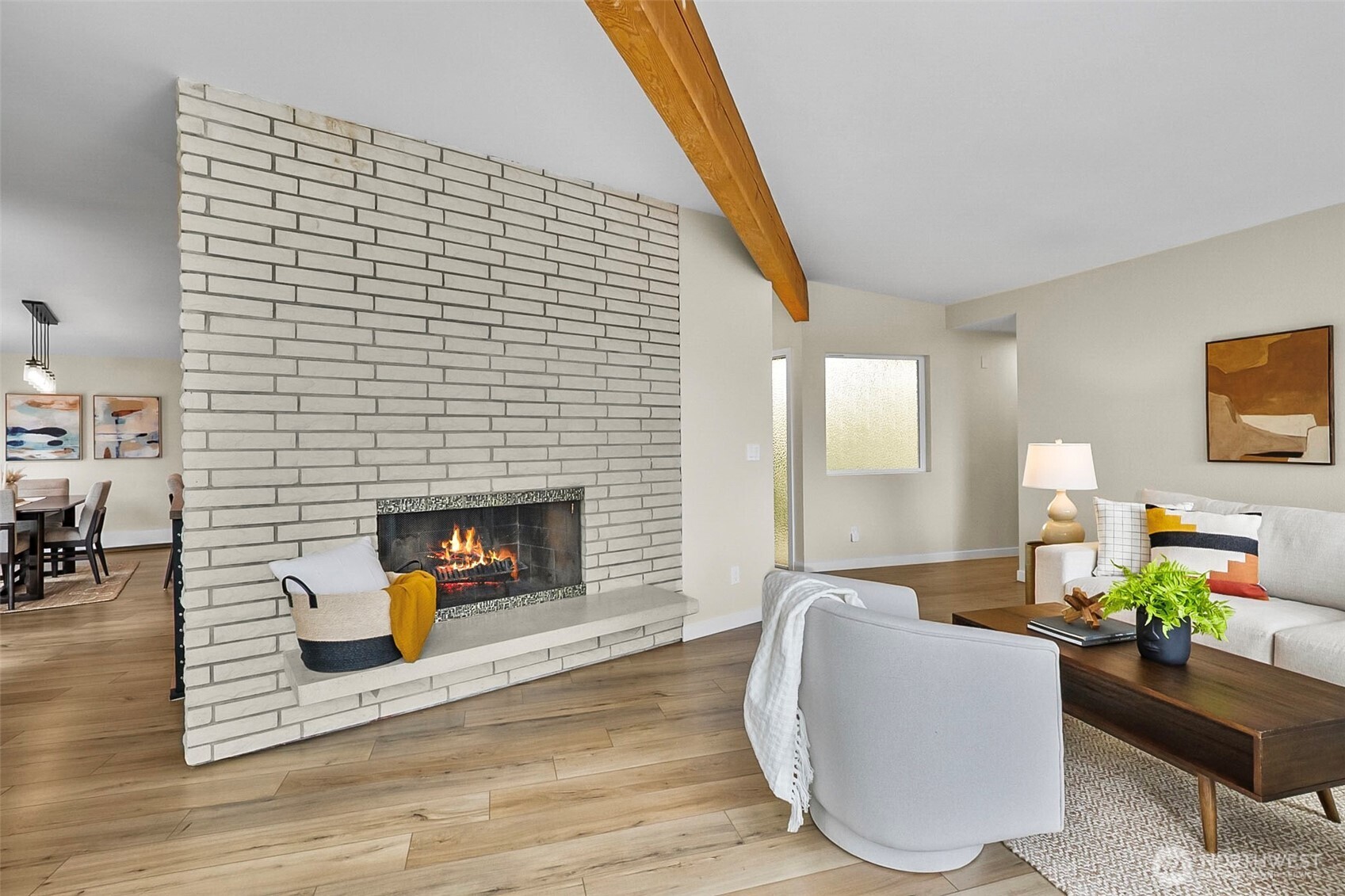 18215 3rd Place Southwest Normandy Park, WA 98166 - Photo 6 of 35 a living room with furniture and a fireplace