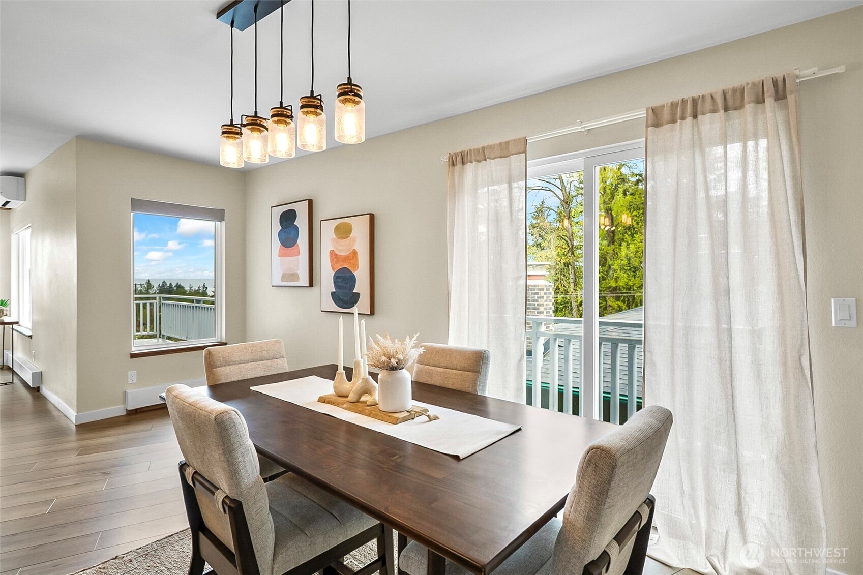 18215 3rd Place Southwest Normandy Park, WA 98166 - Photo 9 of 35 a view of a dining room with furniture window and wooden floor