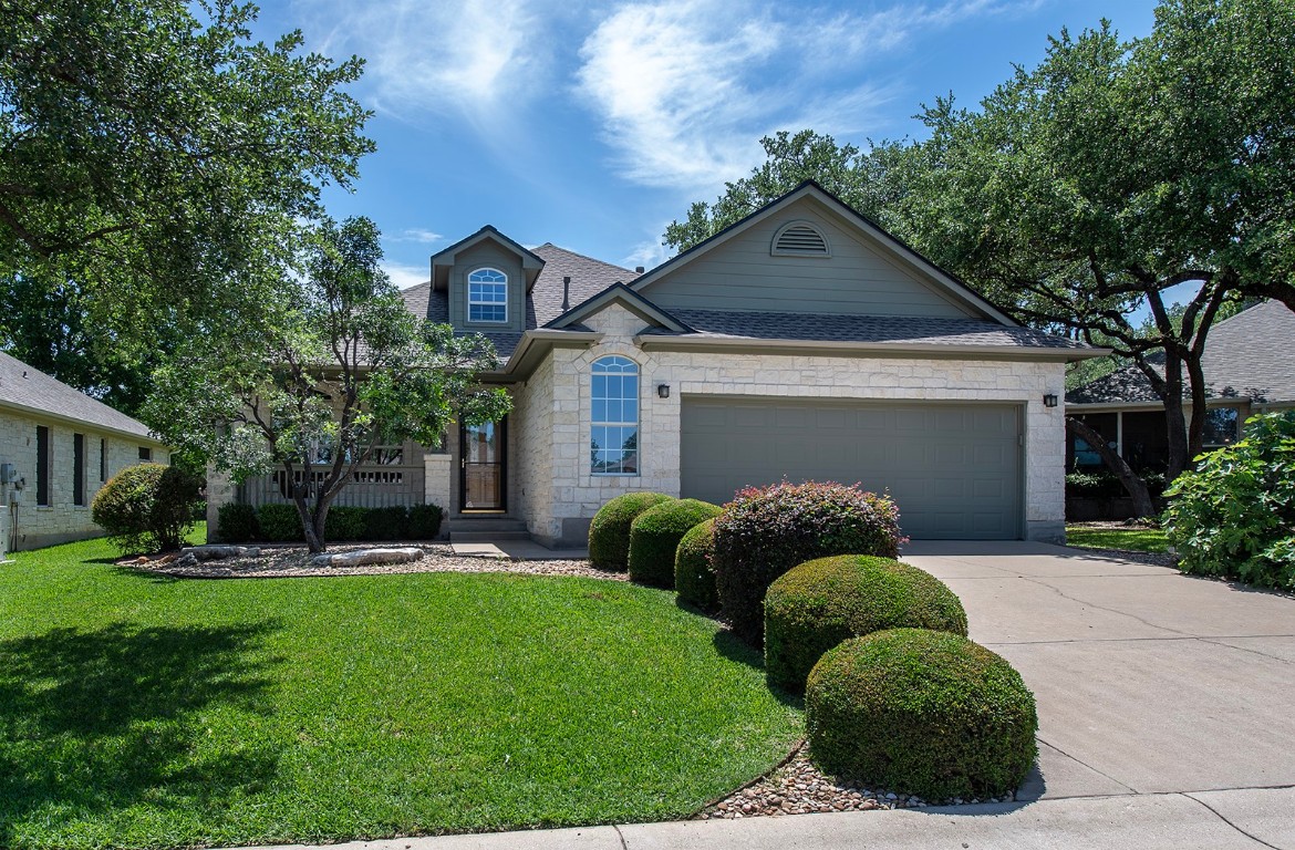 a front view of house with garden