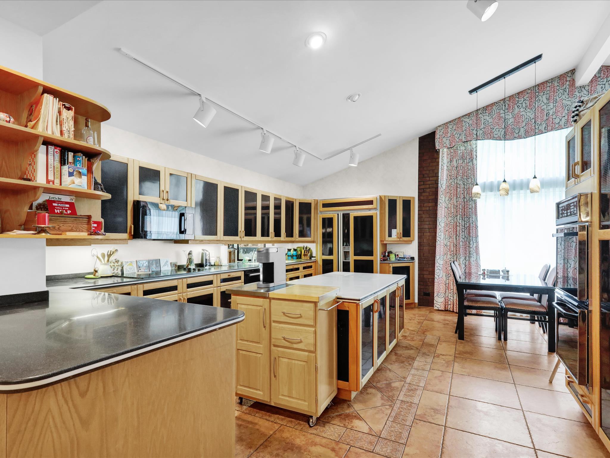 1617 Meadowlark Road Wyomissing, PA 19610 - Photo 13 of 36 Kitchen w vaulted ceiling & view to backyard.