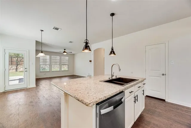 a view of a house with a yard porch and sitting area