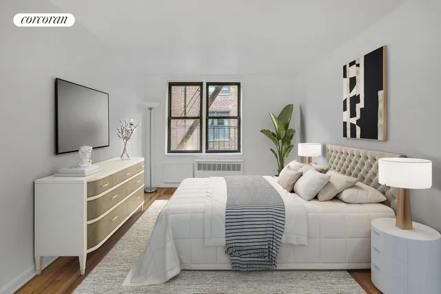 a bedroom with a bed and a couch