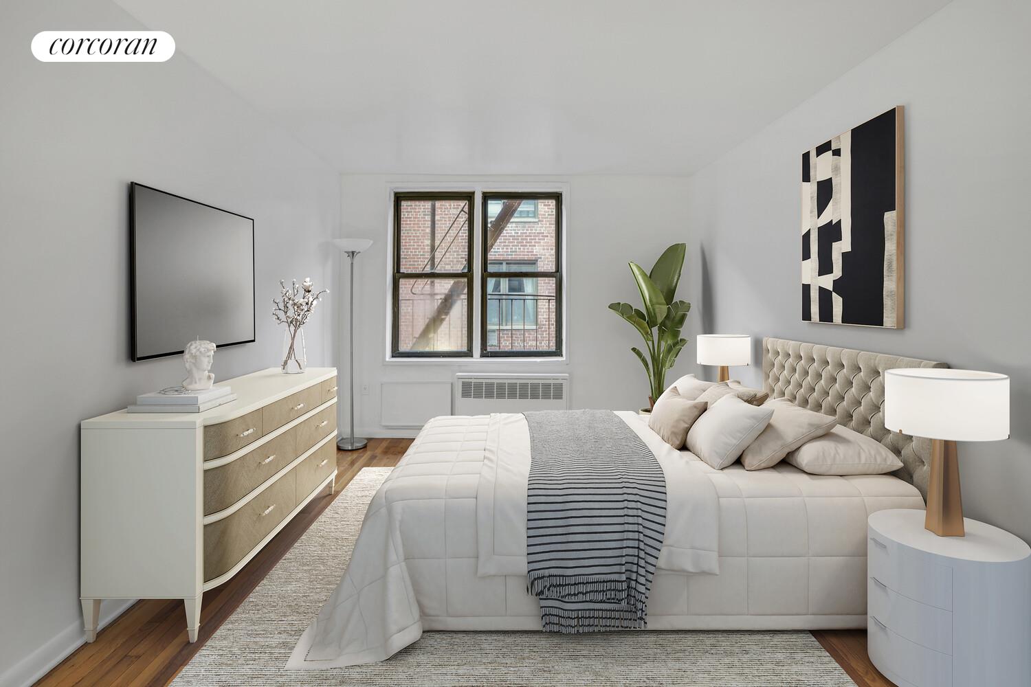 330 Lenox Road, Unit 6S Brooklyn, NY 11226 - Photo 10 of 14 a bedroom with a bed and a couch