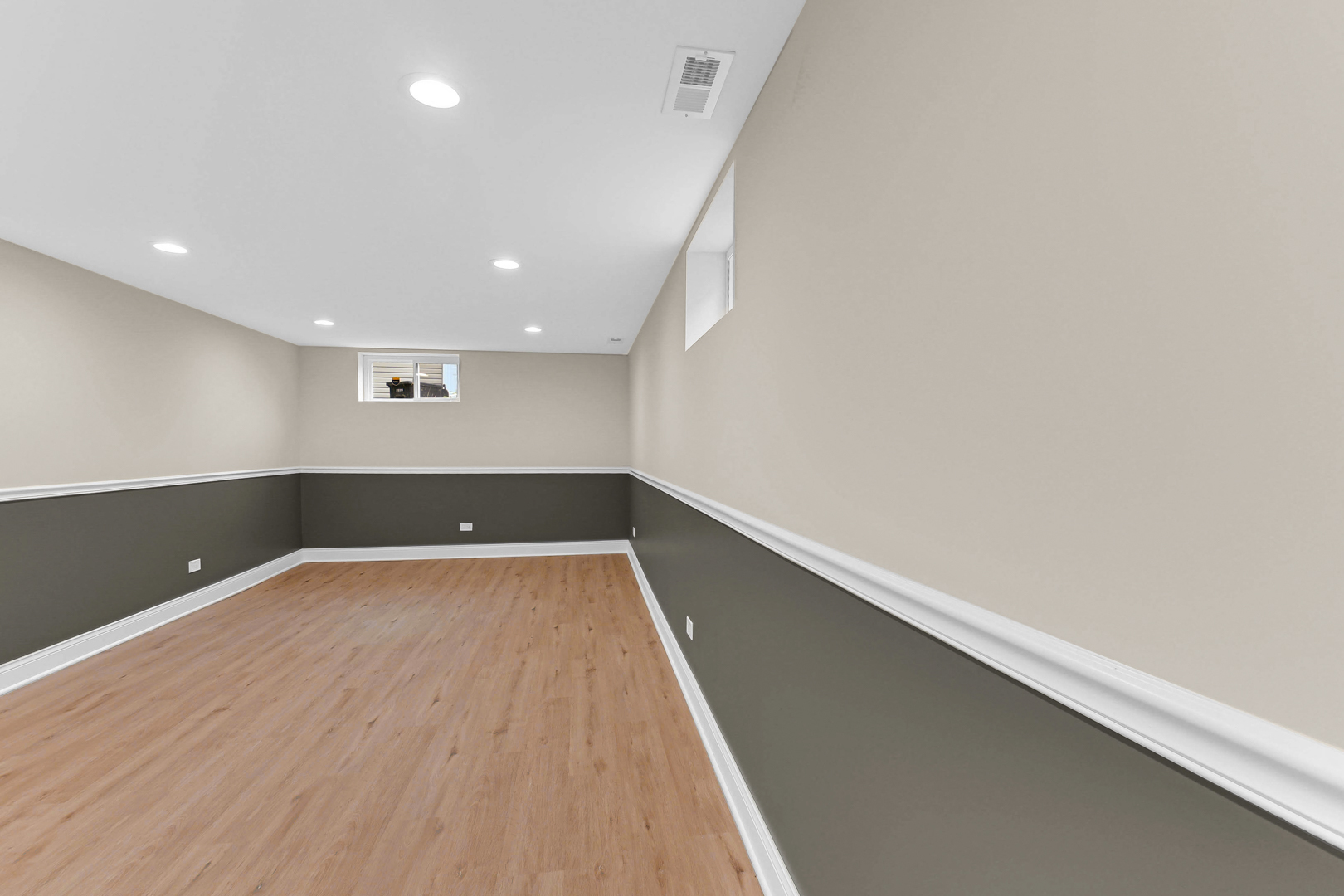 703 West 129th Place Chicago, IL 60628 - Photo 16 of 29 a view of room with window and wooden floor