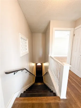 a view of entryway with wooden floor