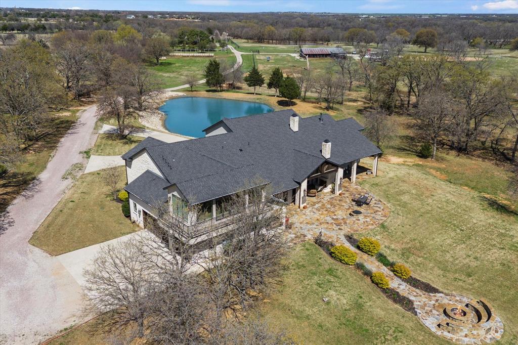8301 Stephens Ranch Road Pilot Point, TX 76258 - Photo 39 of 40 From the back of home over looking pond