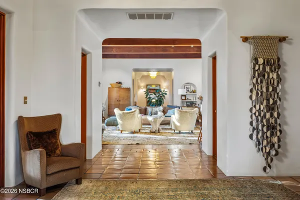 a view of living room kitchen