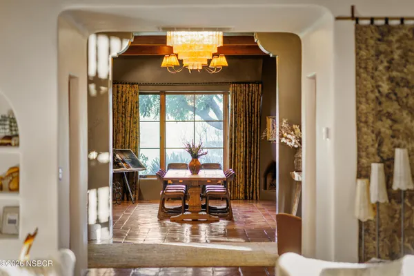 a living room with a couch and a table