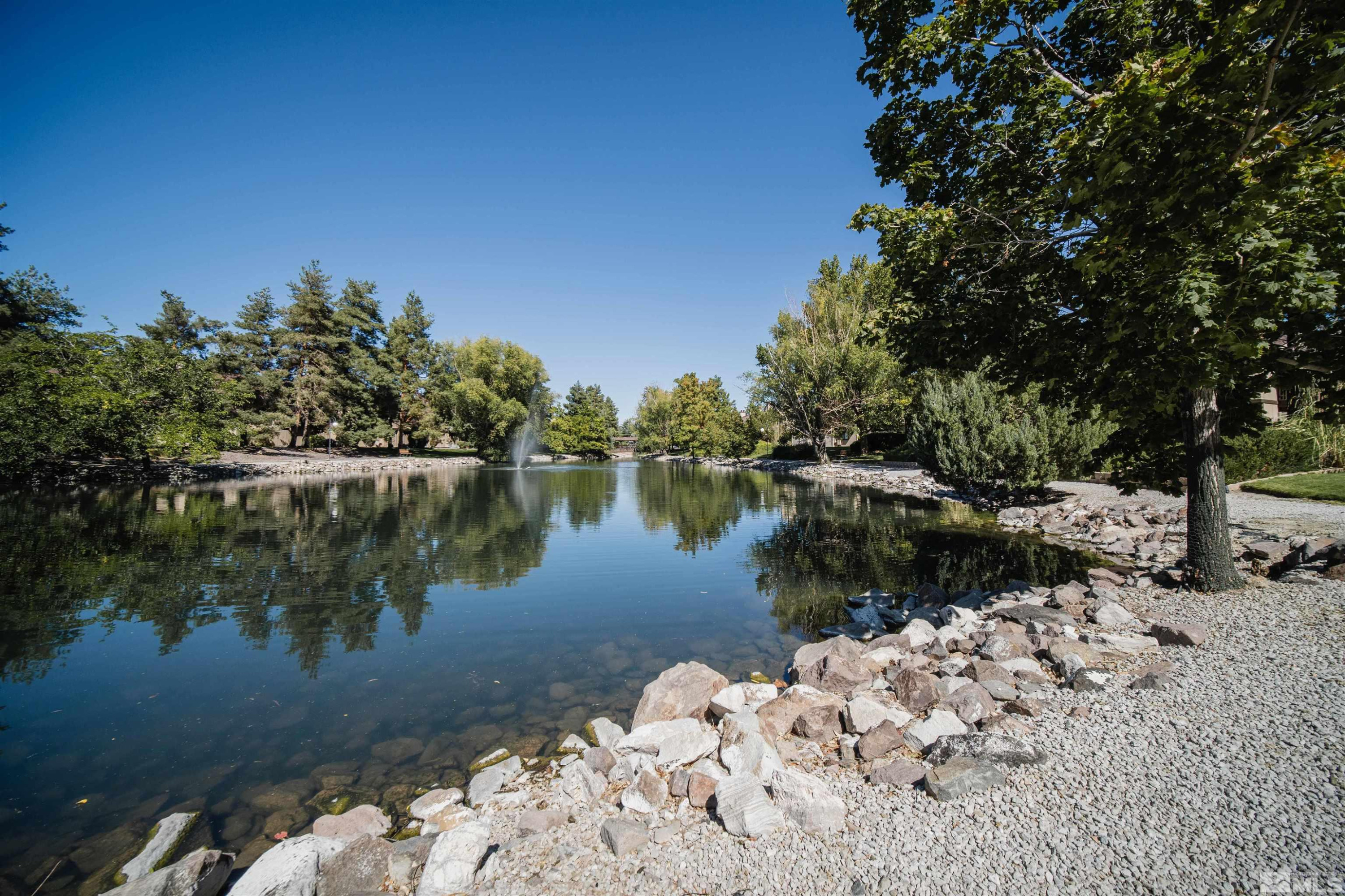 4769 Reggie Road, Unit 254 Reno, NV 89502 - Photo 18 of 23 a view of a lake with a mountain view