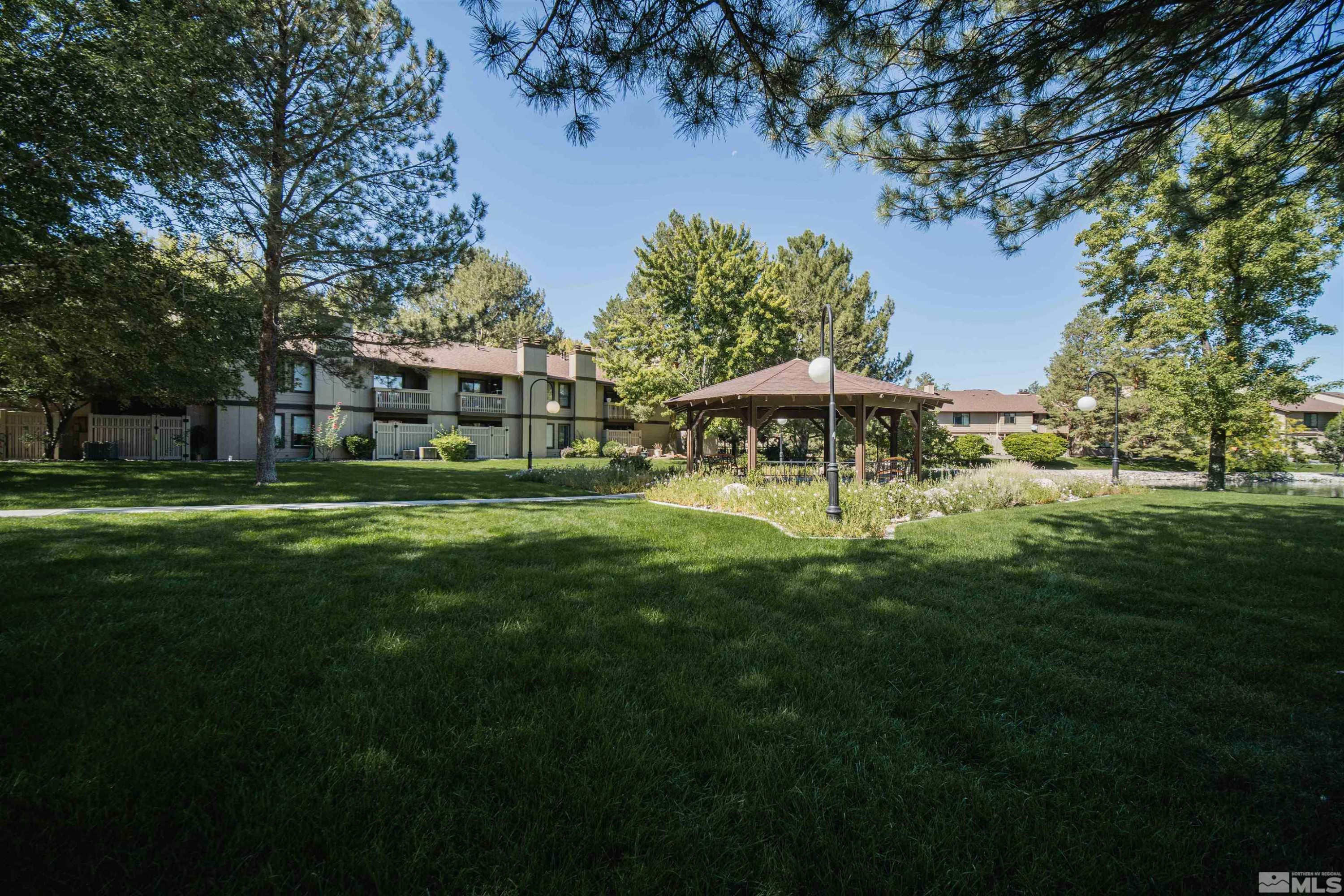 4769 Reggie Road, Unit 254 Reno, NV 89502 - Photo 20 of 23 a view of a house with a big yard