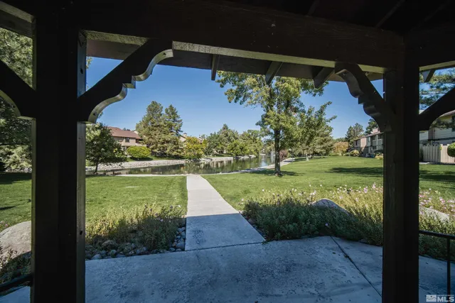a view of swimming pool from a balcony