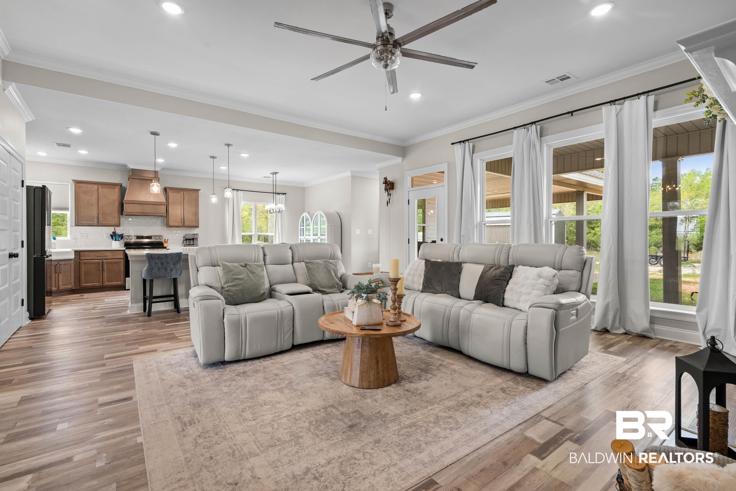 7150 Powell Road, Unit LOT 6A Eight Mile, AL 36613 - Photo 6 of 35 Living room with a ceiling fan, crown molding, plenty of natural light, recessed lighting, and light wood-style floors