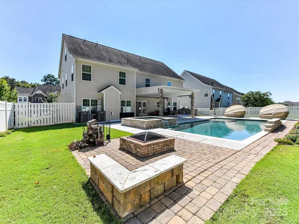 a view of a house with a big yard