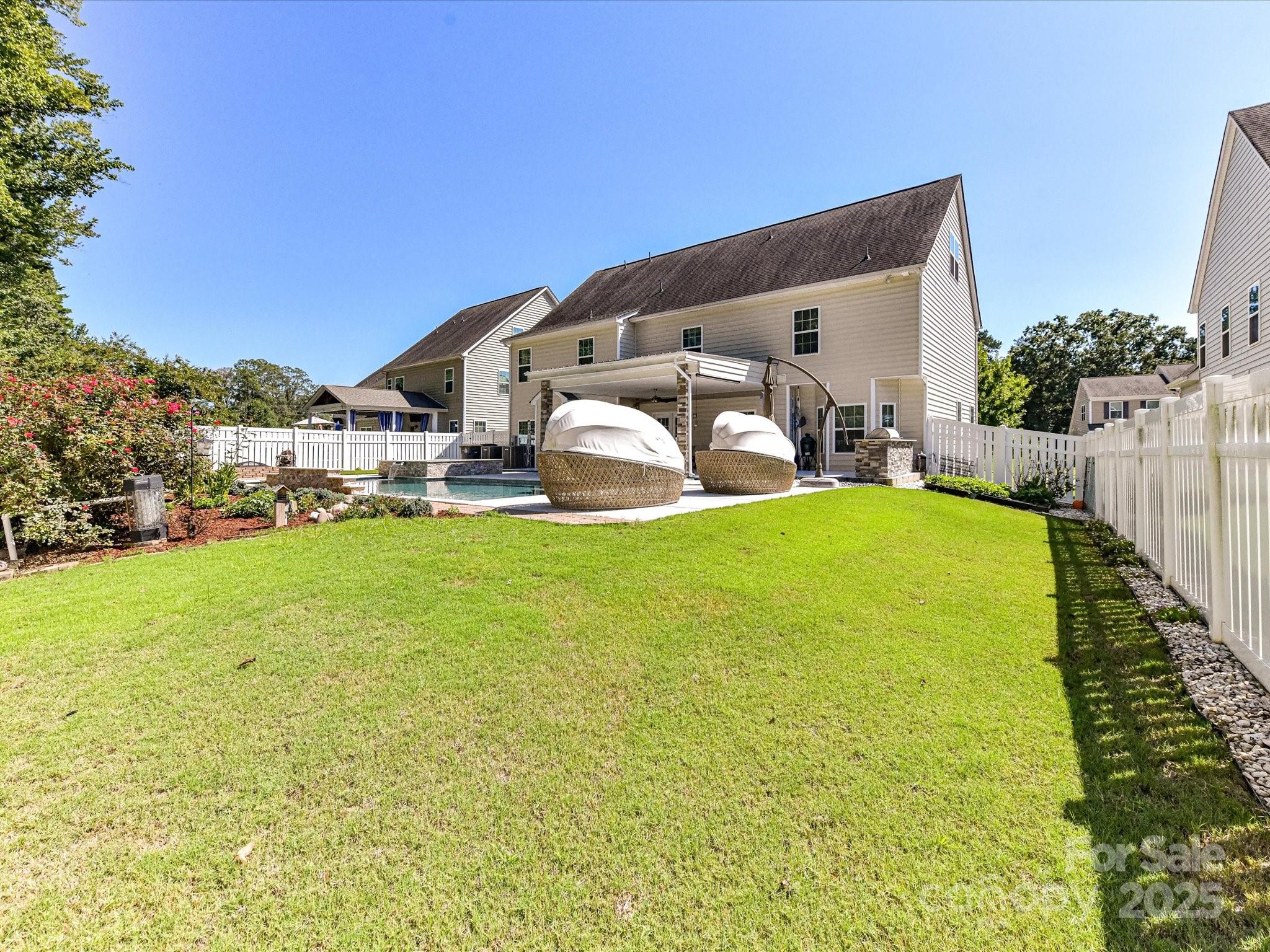 9890 Travertine Trail Davidson, NC 28036 - Photo 40 of 45 a view of a house with a big yard