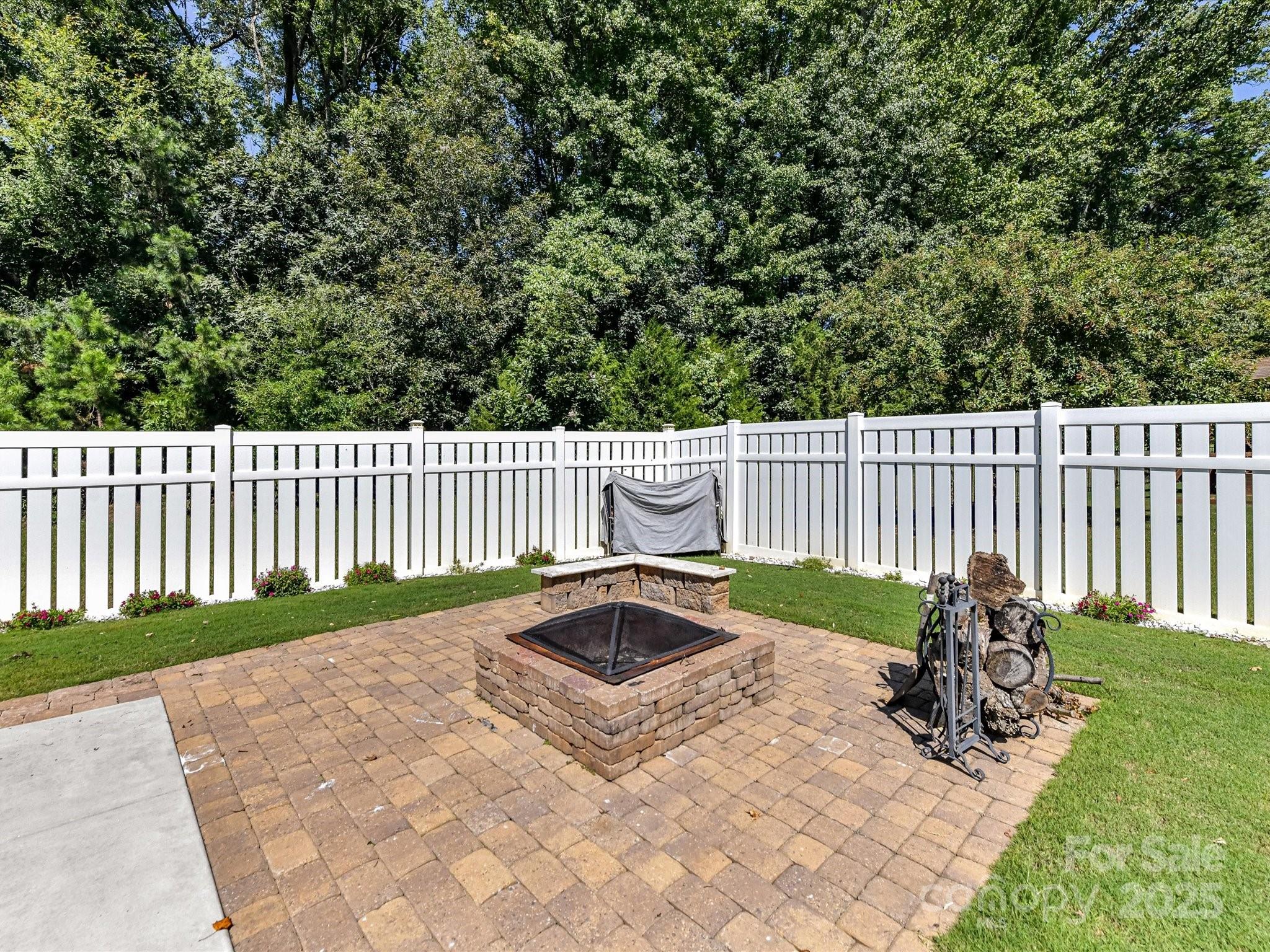9890 Travertine Trail Davidson, NC 28036 - Photo 41 of 45 a garden view with a seating space