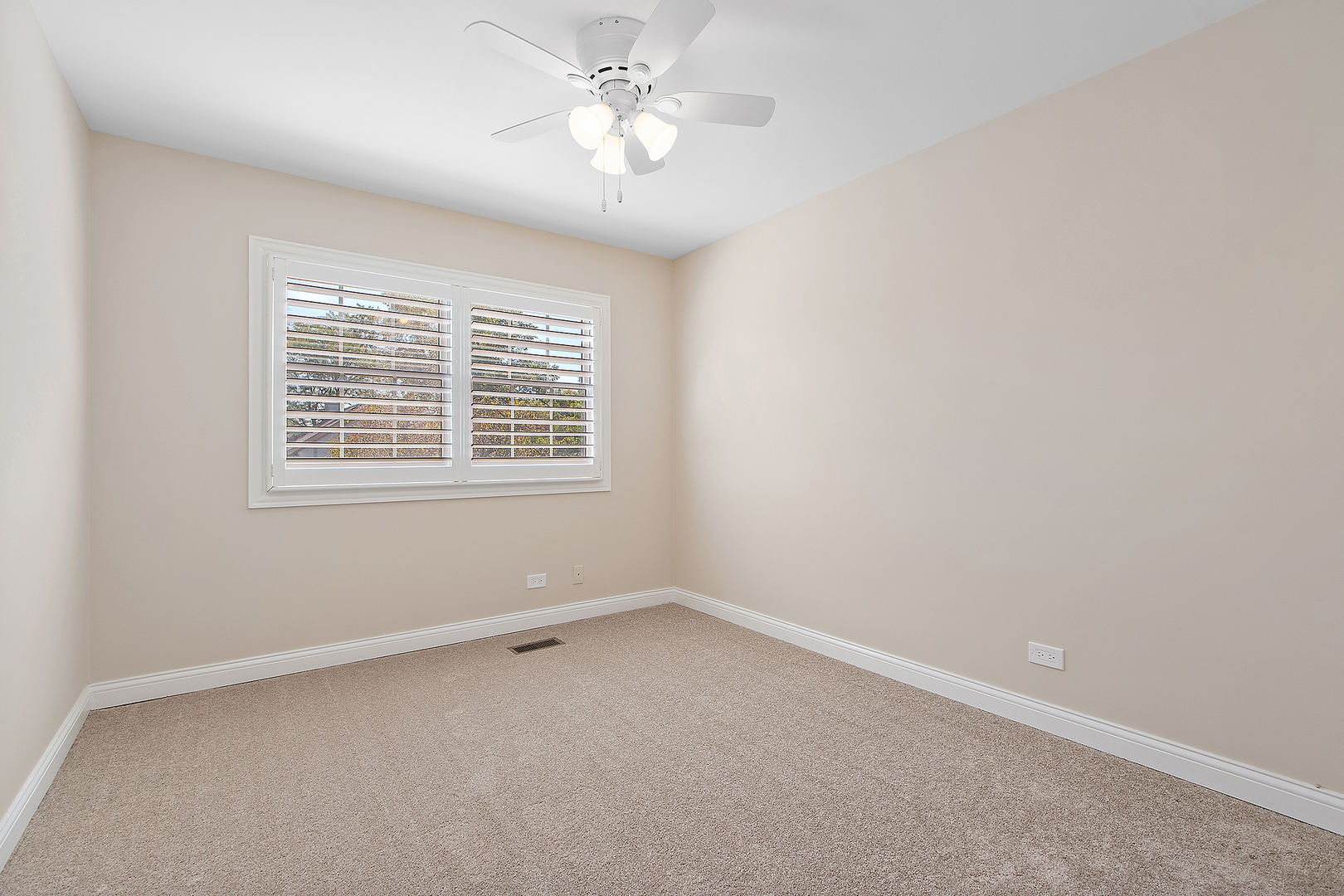 10534 Golf Road Orland Park, IL 60462 - Photo 18 of 54 a view of an empty room with a window