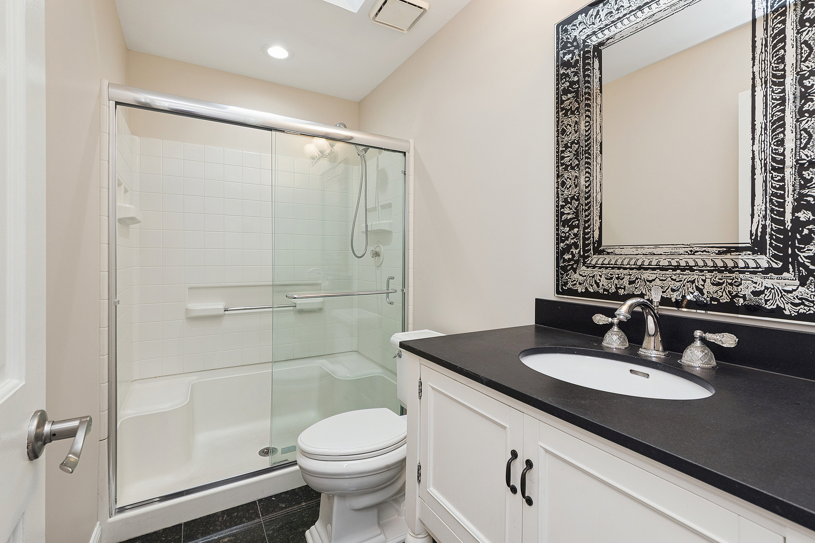 10534 Golf Road Orland Park, IL 60462 - Photo 20 of 54 a bathroom with a sink a toilet and shower