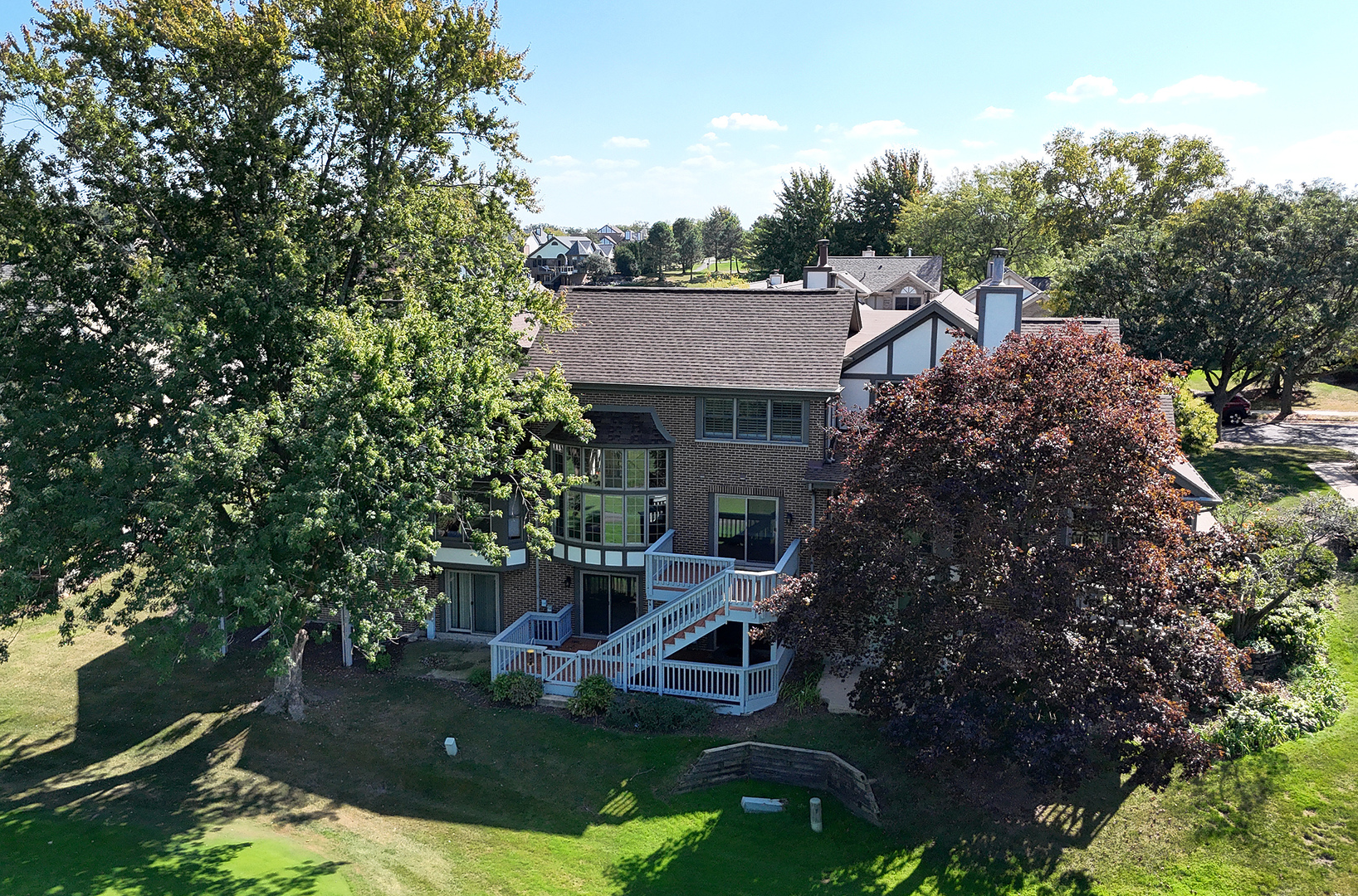 10534 Golf Road Orland Park, IL 60462 - Photo 41 of 54 a view of backyard with outdoor seating and green space